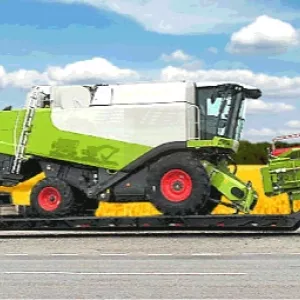 Перевозка комбайна,с/х техники,трактора,сеялки,экскаватора бульдозера катка,грейдера на трале перевезти по Украине.